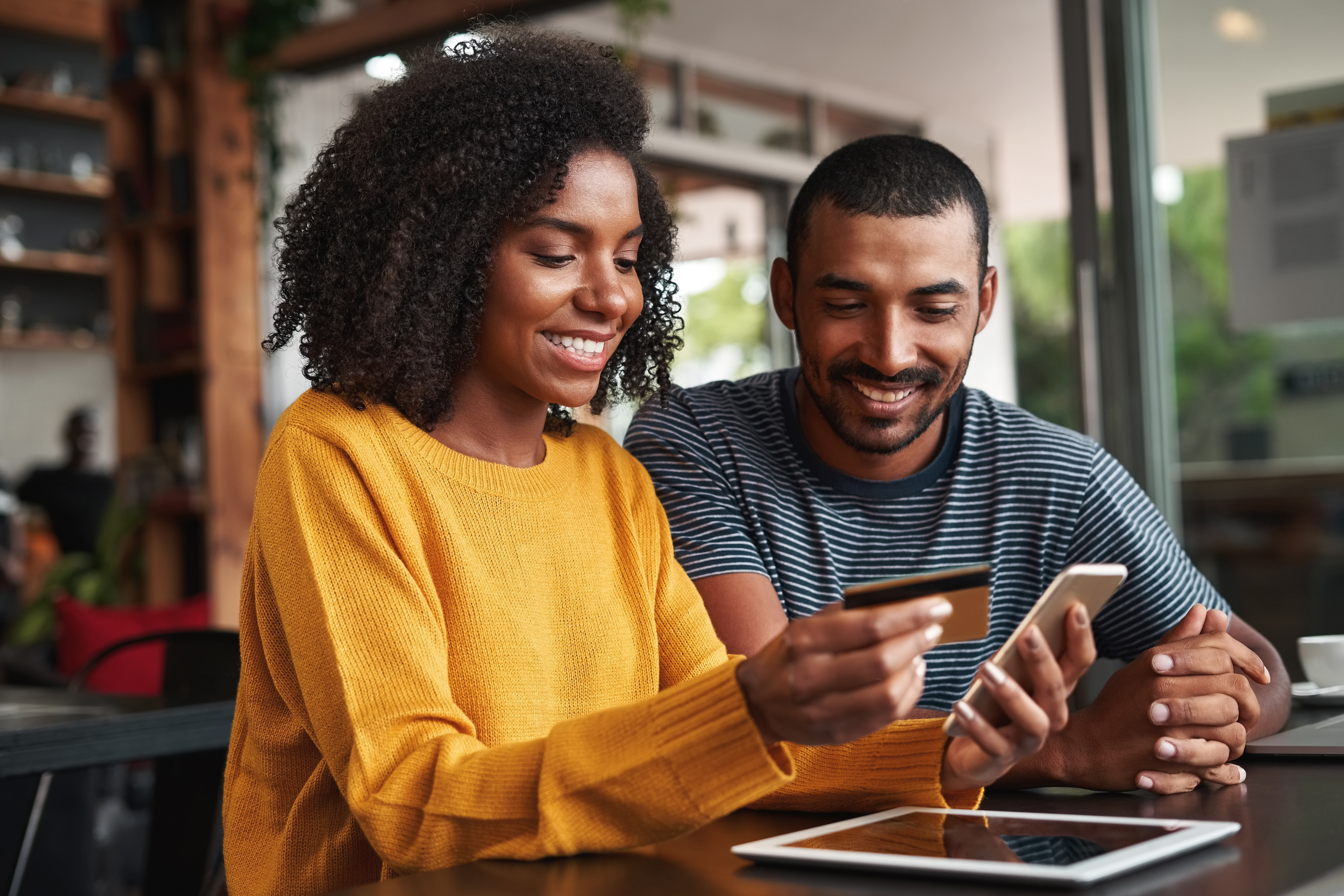 People paying bill by phone securely.