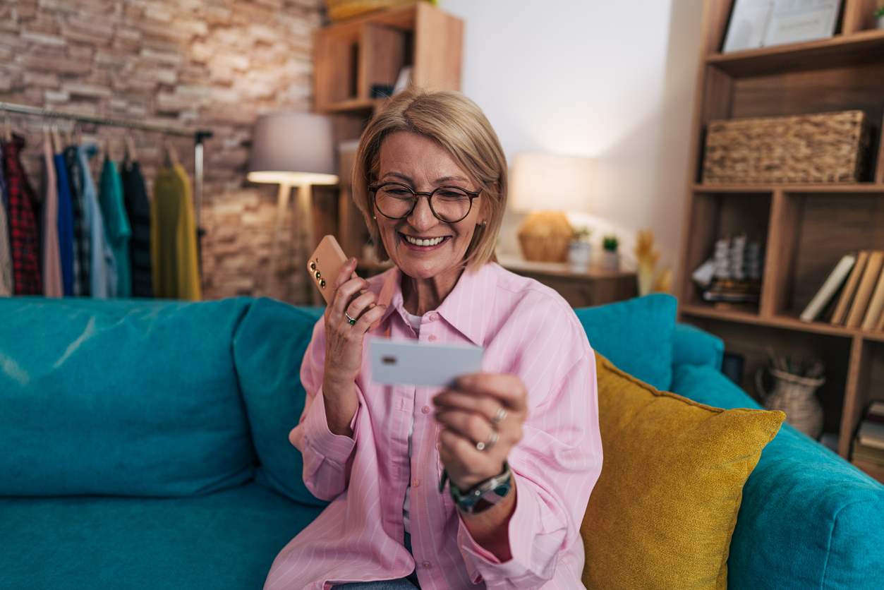 Woman paying bill due to Automated Billing Reminder